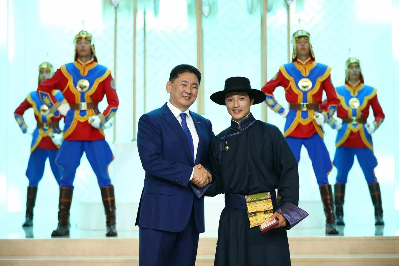 Ochir receiving a national honour in Mongolia